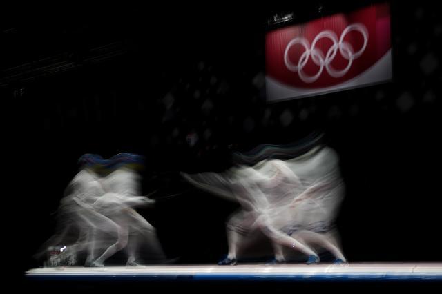 世俱杯买球-日媒：菅义伟不考虑取消奥运 男重团体金牌“悲愿”